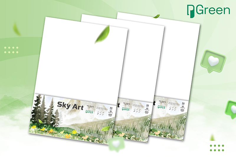 a group of white papers with green leaves